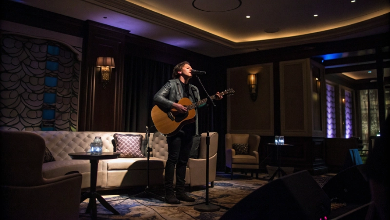 Acoustic musician performing with guitar on intimate casino lounge stage with mood lighting